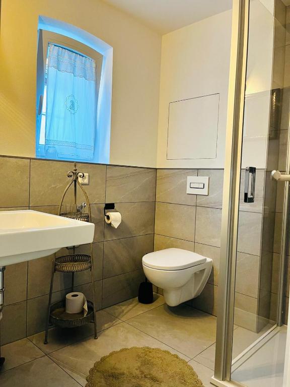 Ein Badezimmer in der Unterkunft Ferienwohnung Zur Alten Tischlerei
