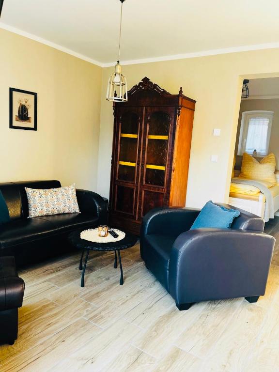 Ein Sitzbereich in der Unterkunft Ferienwohnung Zur Alten Tischlerei
