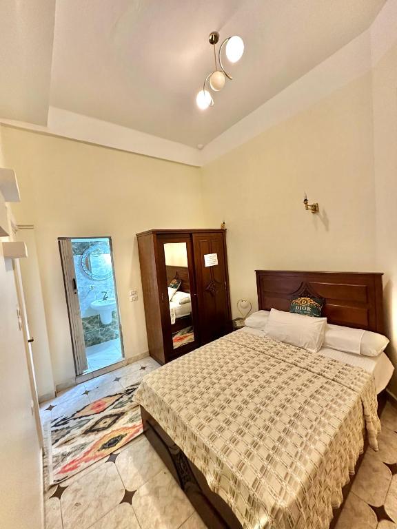 Postel nebo postele na pokoji v ubytování Dior Hotel Downtown