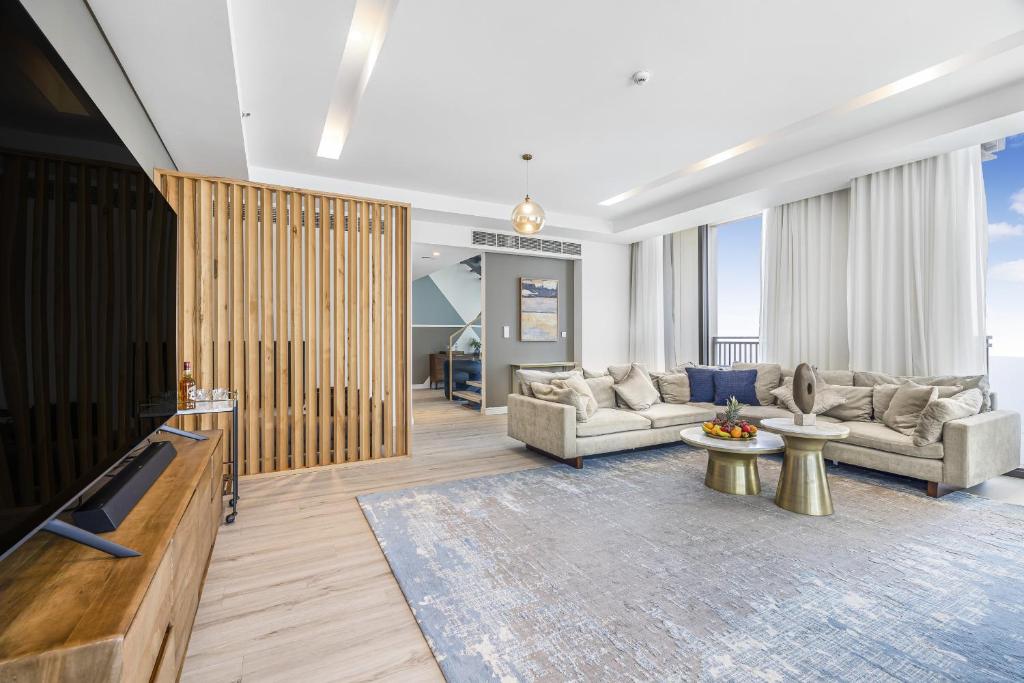 Posezení v ubytování EDEN'S Homes & Villas - 52-42 Emaar