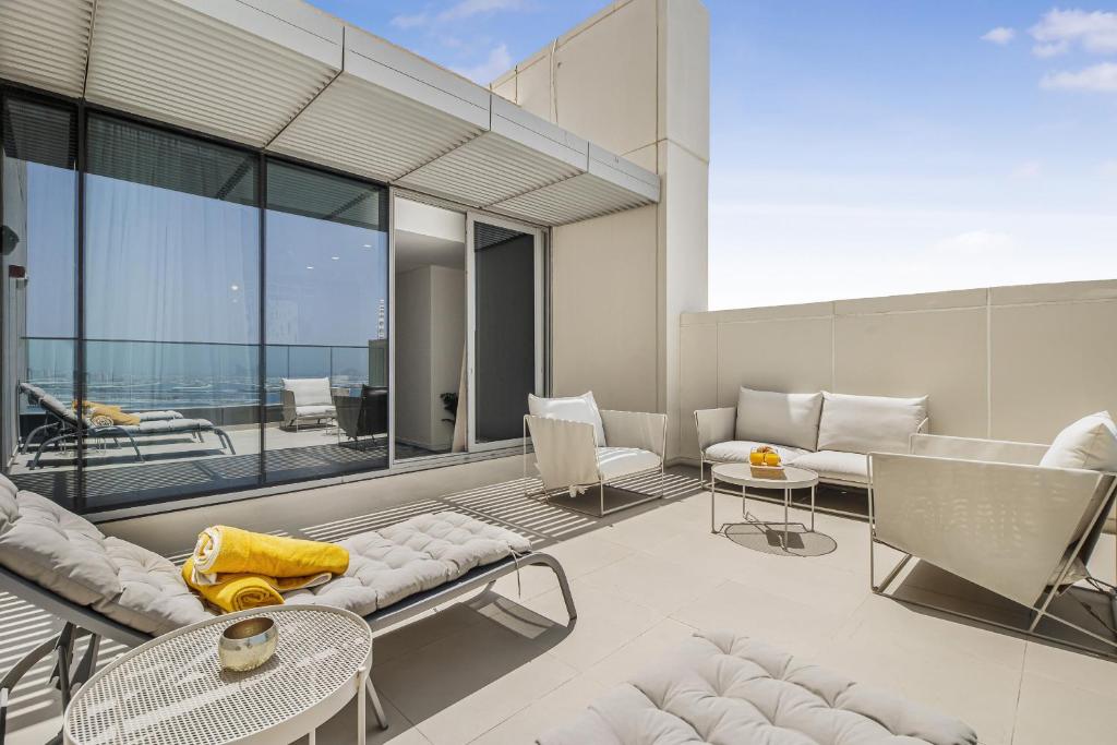 Posezení v ubytování EDEN'S Homes & Villas - 52-42 Emaar