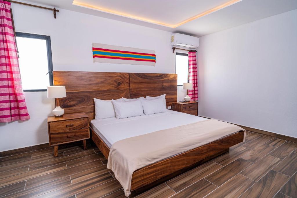 Postel nebo postele na pokoji v ubytování Digital Nomads Hotel & CoLiving
