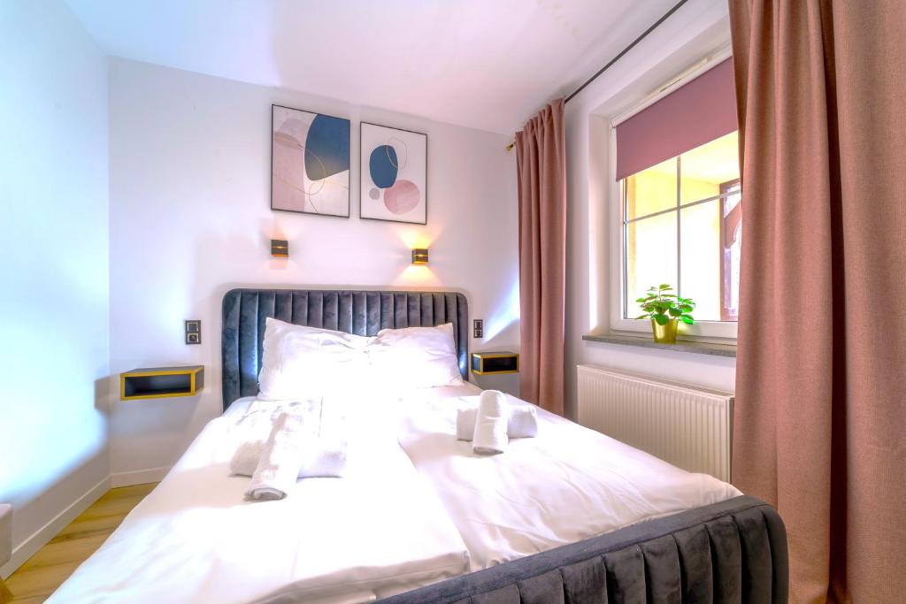 Posteľ alebo postele v izbe v ubytovaní Ametyst A2 - Apartament Rodzinny - Prywatna SAUNA