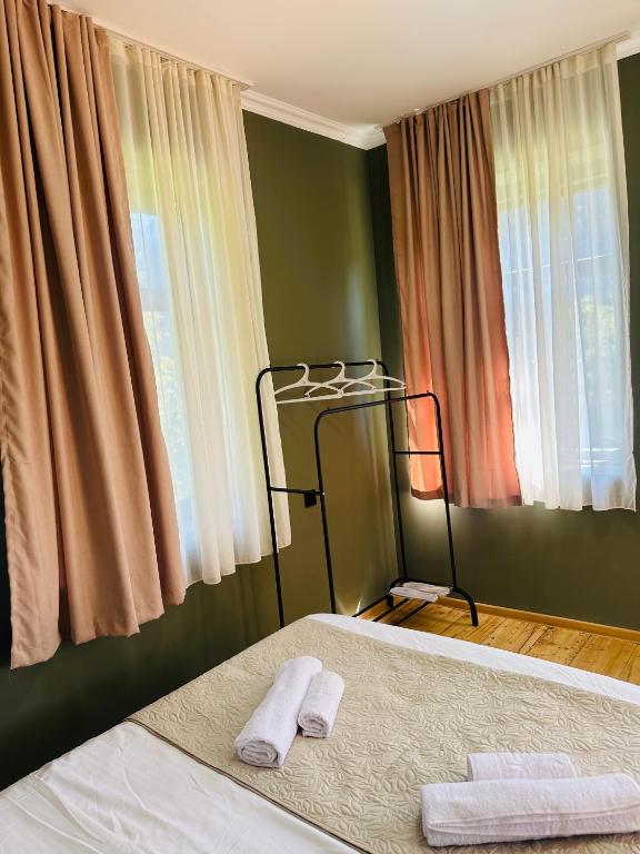 Postel nebo postele na pokoji v ubytování Family Hotel - White House Racha