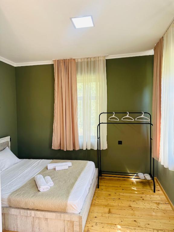 Postel nebo postele na pokoji v ubytování Family Hotel - White House Racha