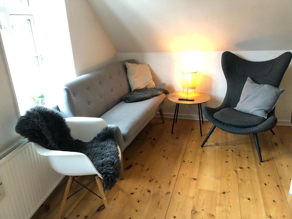 Posezení v ubytování Huset ved springvandet