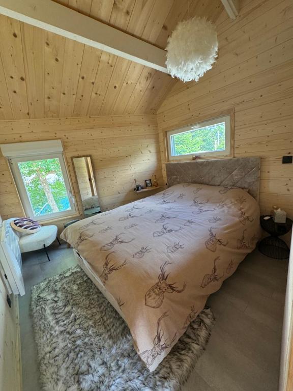 Postel nebo postele na pokoji v ubytování Chalet Pagotin - Le Renversant