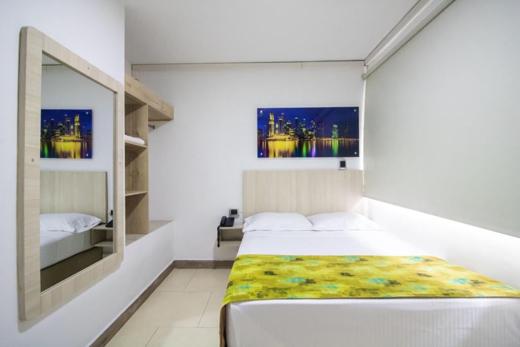 Postel nebo postele na pokoji v ubytování Hotel Boutique Street 50