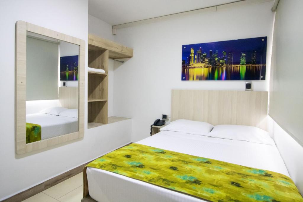 Postel nebo postele na pokoji v ubytování Hotel Boutique Street 50