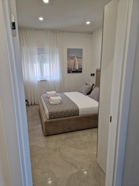 Posteľ alebo postele v izbe v ubytovaní Lavanda Centar Makarska