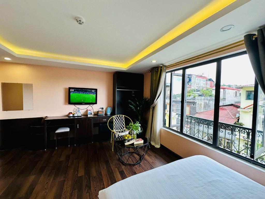 TV a/nebo společenská místnost v ubytování HeLLo Sapa Hotel