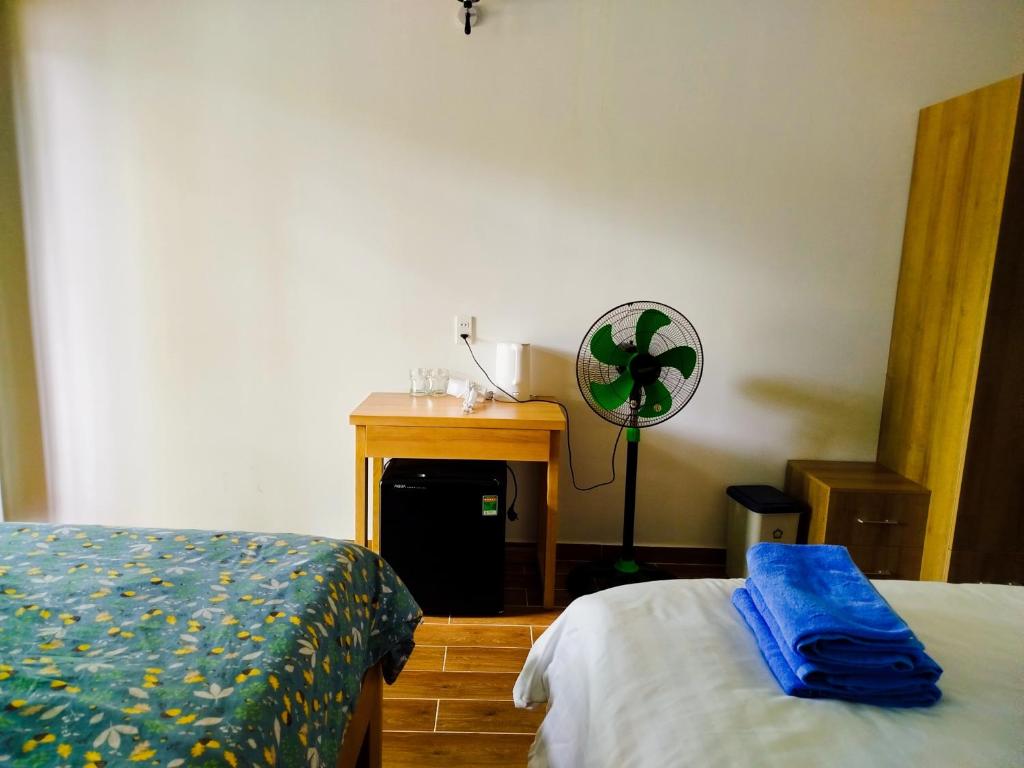 Postel nebo postele na pokoji v ubytování Green Hope Lodge