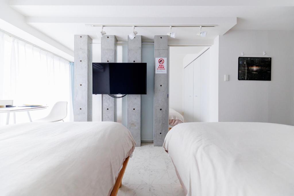 TV a/nebo společenská místnost v ubytování Aquamarine