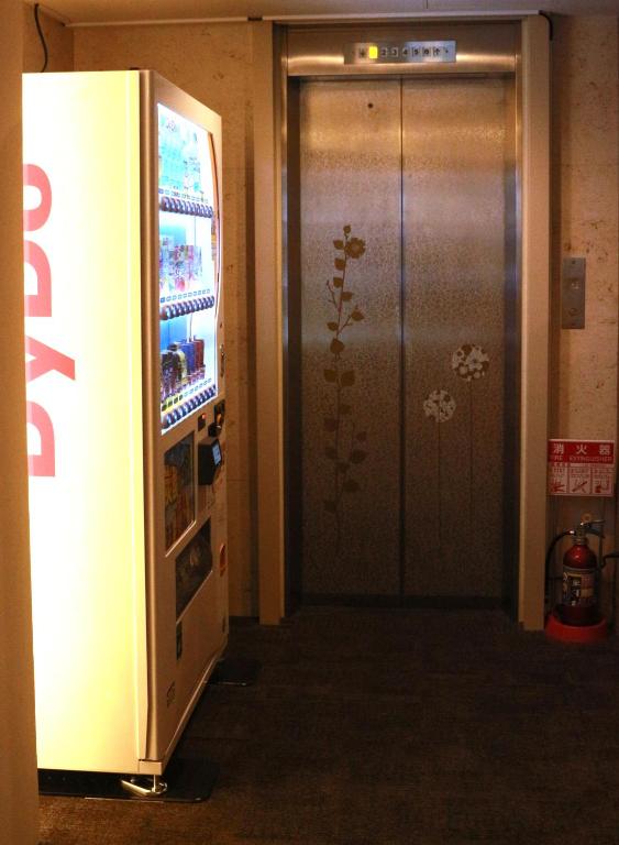 Kuchyň nebo kuchyňský kout v ubytování Hostel OSAKA