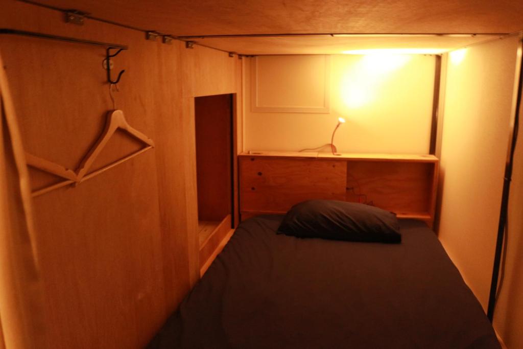 Postel nebo postele na pokoji v ubytování Hostel OSAKA