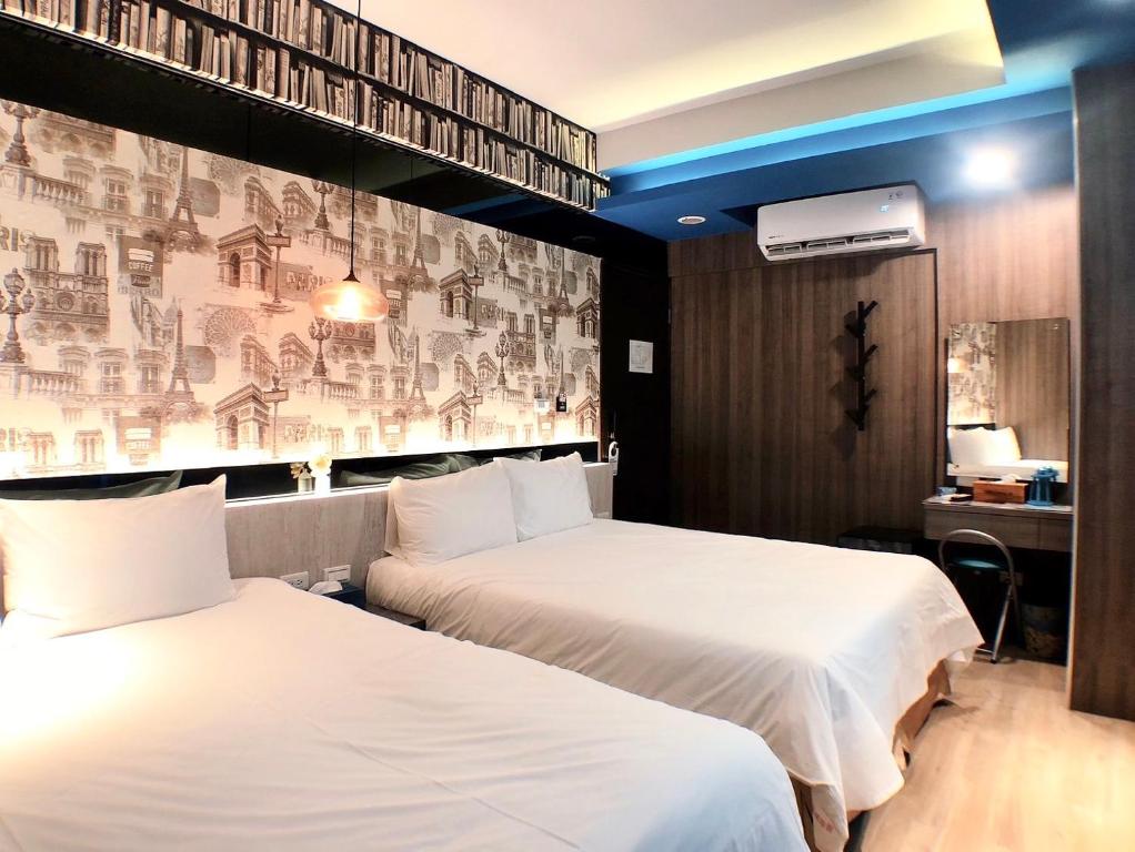 Postel nebo postele na pokoji v ubytování 陽光空氣水海景電梯民宿 Sunshine Air Water Sea View Homestay