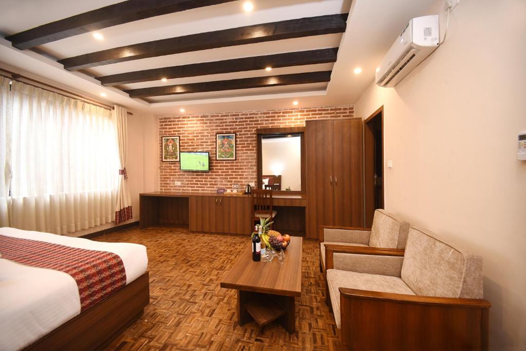Postel nebo postele na pokoji v ubytování Skye Inn Kathmandu
