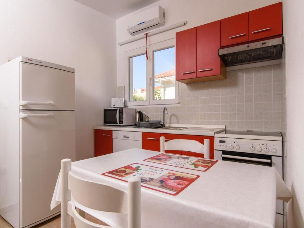 Kuchyň nebo kuchyňský kout v ubytování Apartments Beba - peaceful location