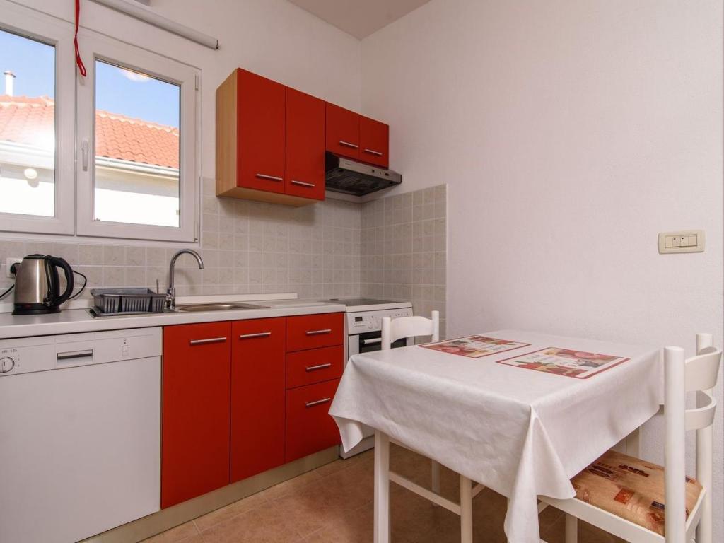 Kuchyň nebo kuchyňský kout v ubytování Apartments Beba - peaceful location