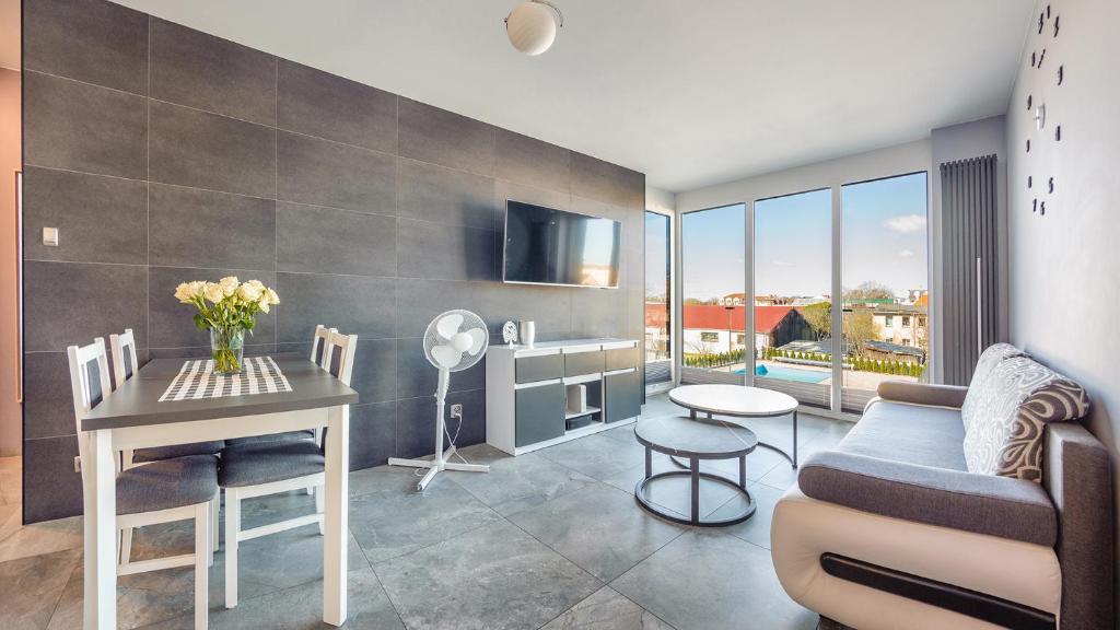 Posedenie v ubytovaní Apartamenty Holiday City - Perłowa Przystań