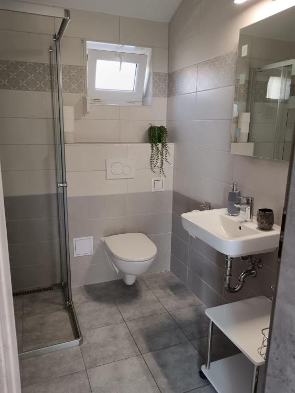 Koupelna v ubytování Apartmán u Révy