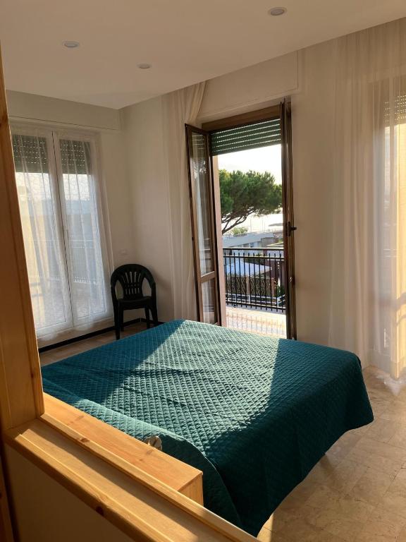 Postel nebo postele na pokoji v ubytování Hotel Valentino