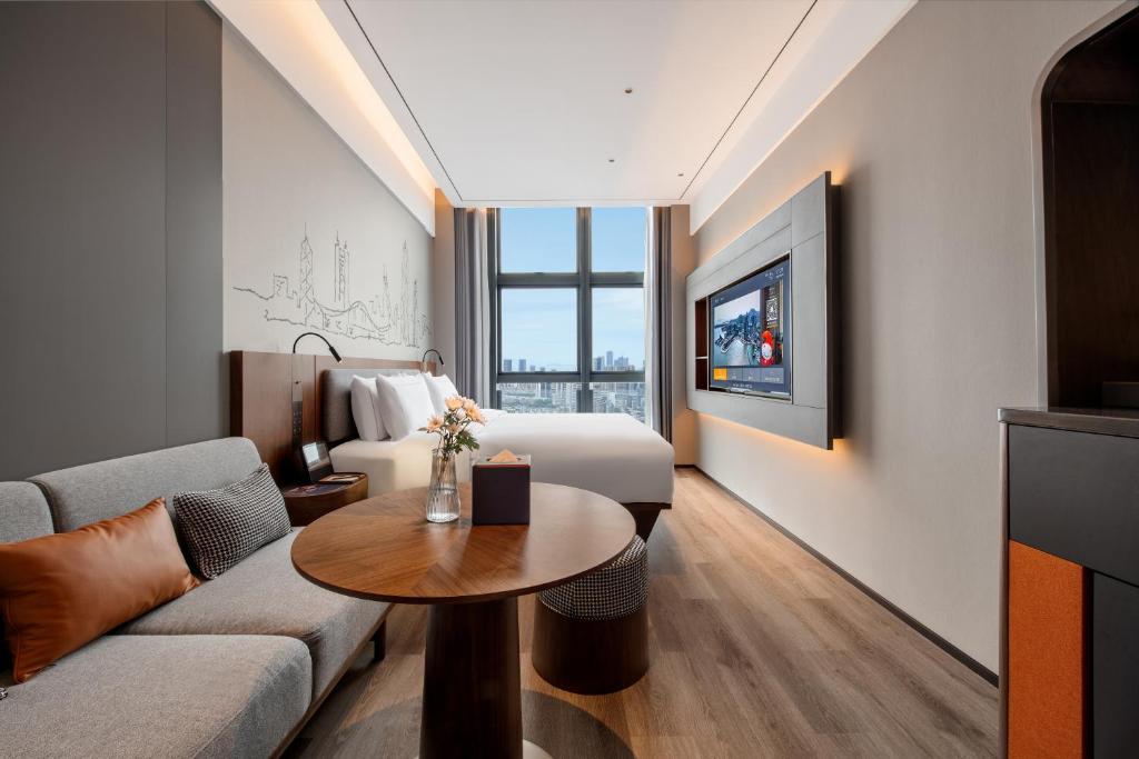 TV a/nebo společenská místnost v ubytování UrCove by Hyatt Shenzhen Bay Nanyou