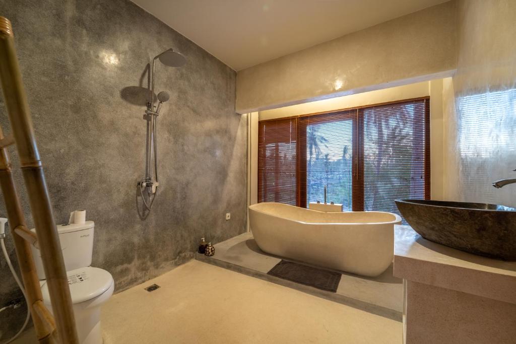 Koupelna v ubytování Yulaman Hotel