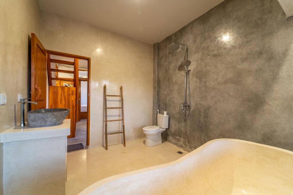 Koupelna v ubytování Yulaman Hotel