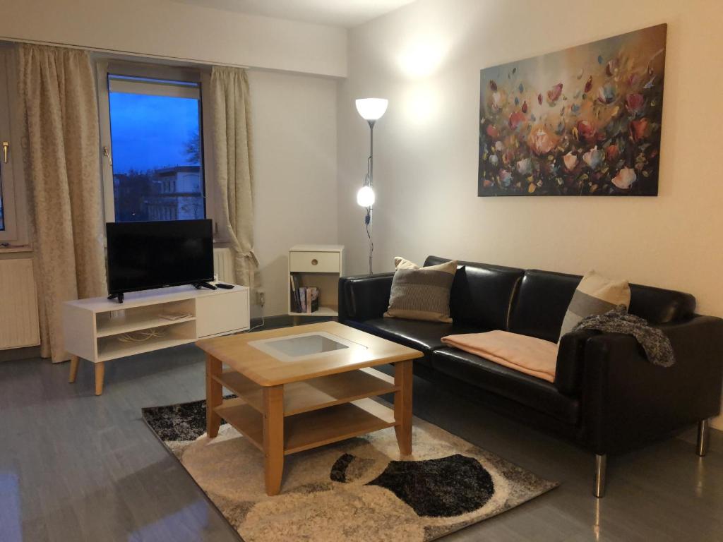 Posezení v ubytování Moderne Vollmöblierte Wohnung