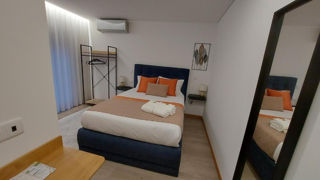 Postel nebo postele na pokoji v ubytování DiROMANE