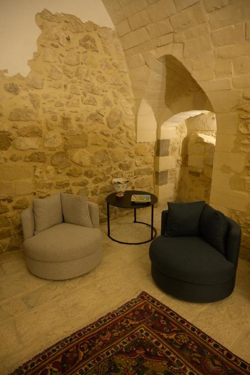 Posezení v ubytování P43 Sicilian Suites