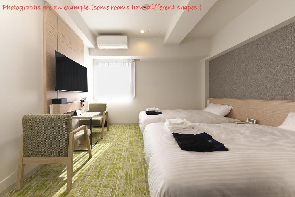 TV a/nebo společenská místnost v ubytování Fourz Hotel Kintetsu Osaka-Namba