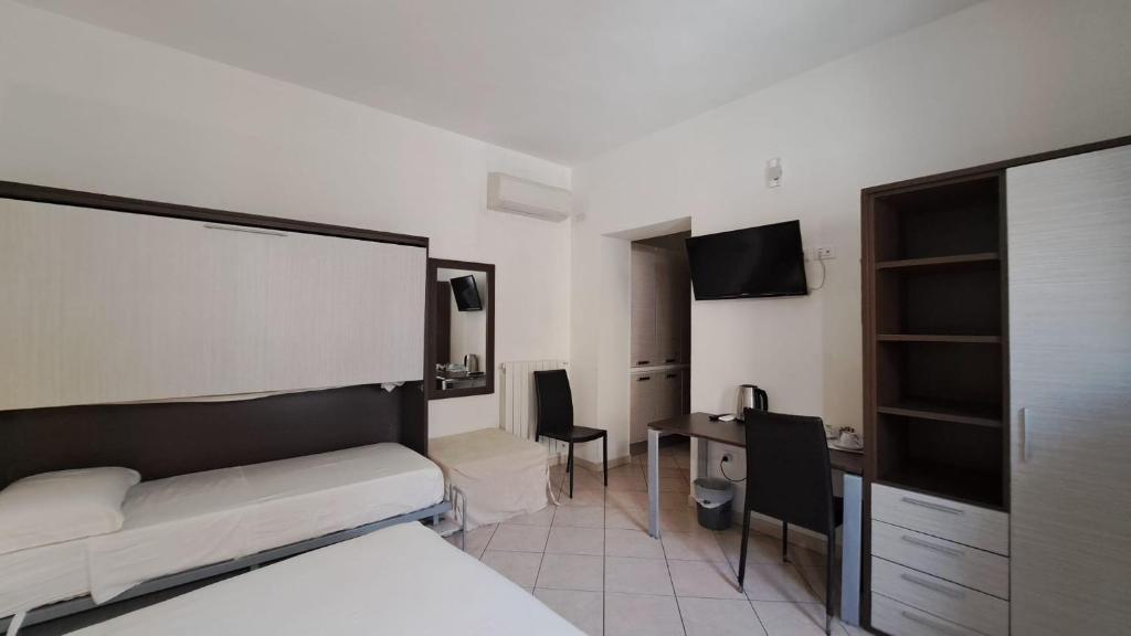 Postel nebo postele na pokoji v ubytování Domo - Guest-House Il Nespolo Fiorito