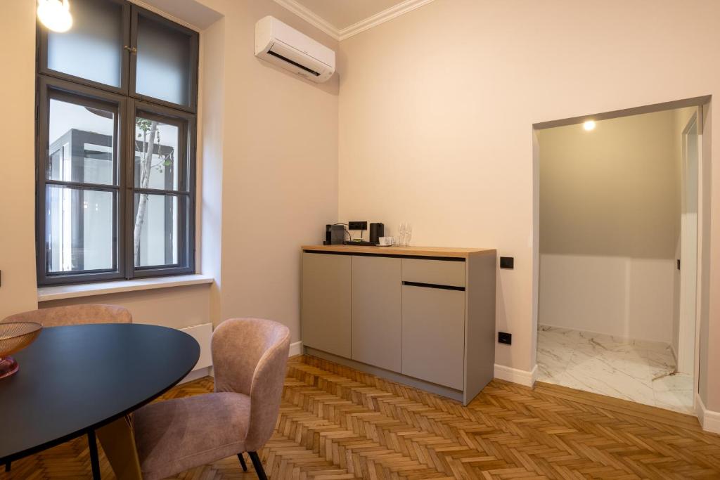Kuchyň nebo kuchyňský kout v ubytování Bloom Downtown Suites