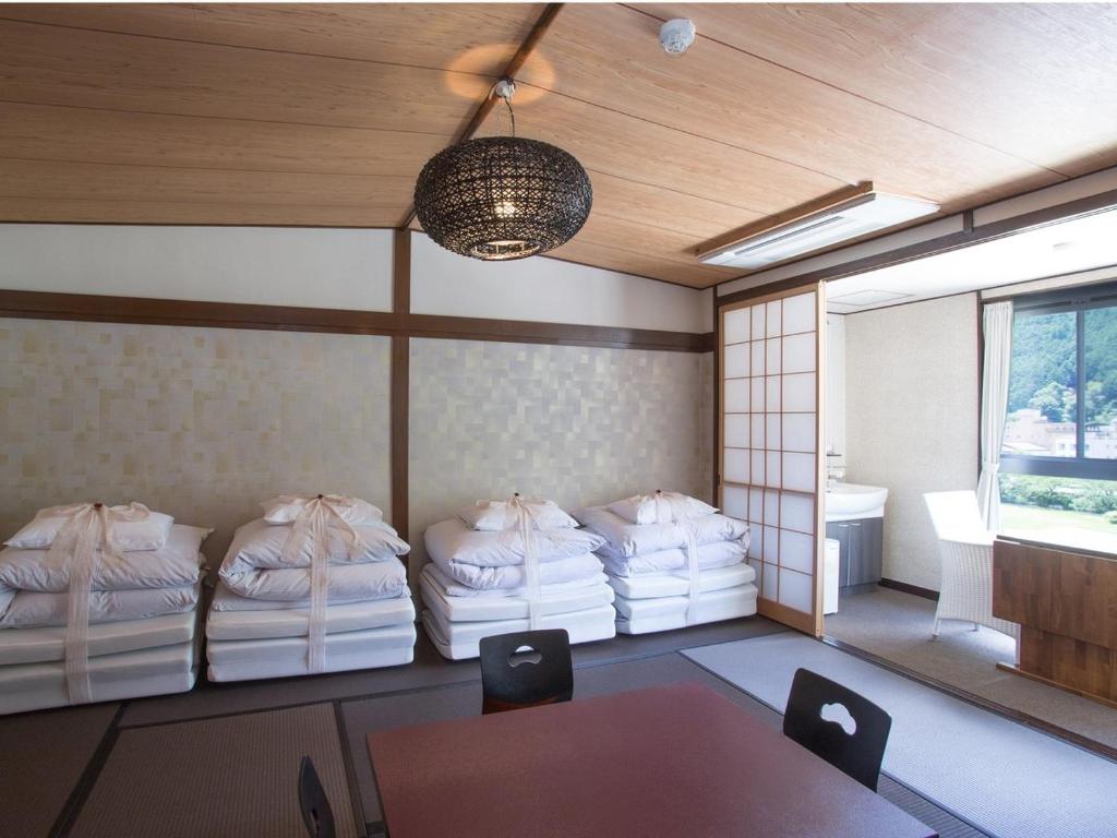 Istumisnurk majutusasutuses 桜 River Side Stay下呂温泉