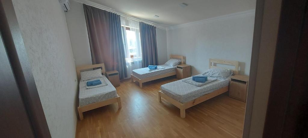 Postel nebo postele na pokoji v ubytování Kenut Hostel