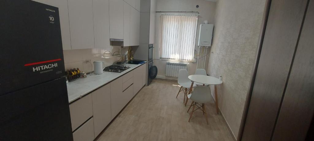 Kuchyň nebo kuchyňský kout v ubytování Kenut Hostel