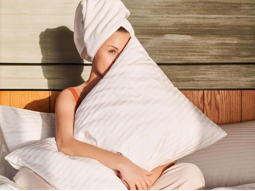 Postel nebo postele na pokoji v ubytování Grand Mercure Petra