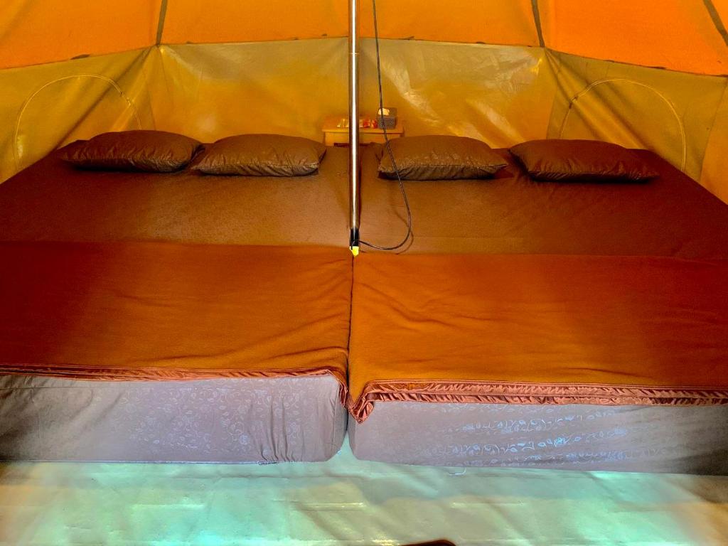 Postel nebo postele na pokoji v ubytování Be Glamping Lembang