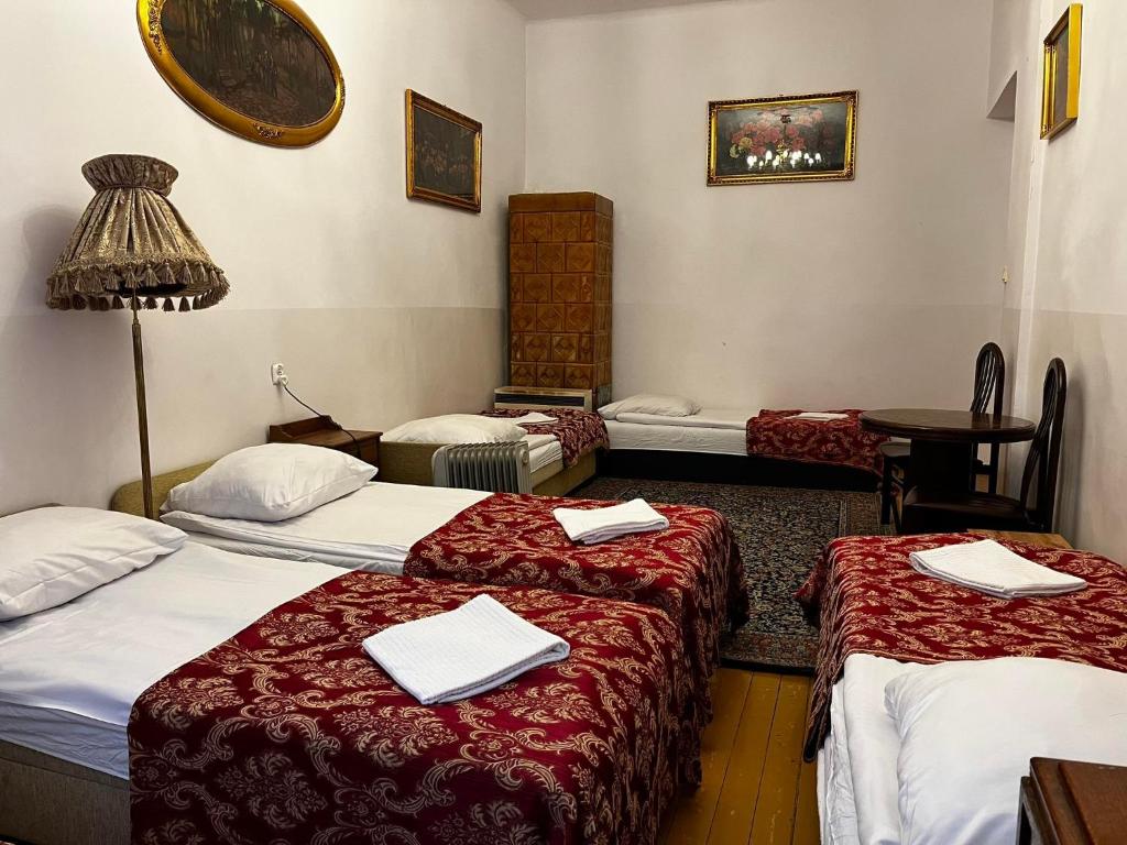 Posteľ alebo postele v izbe v ubytovaní Metropolitan Apartments