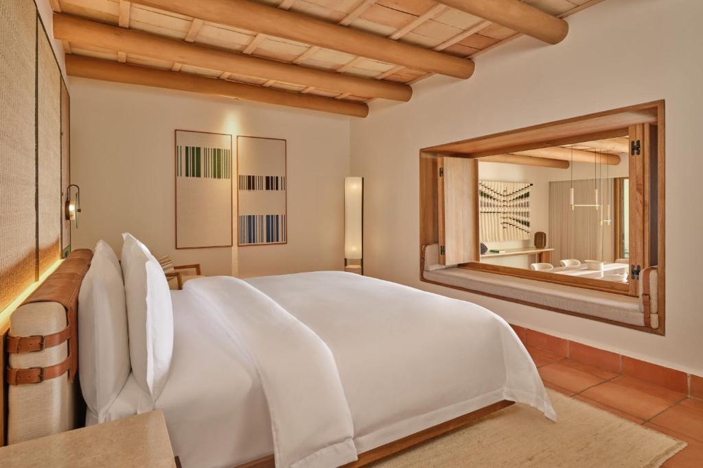 Postel nebo postele na pokoji v ubytování The St. Regis Punta Mita Resort