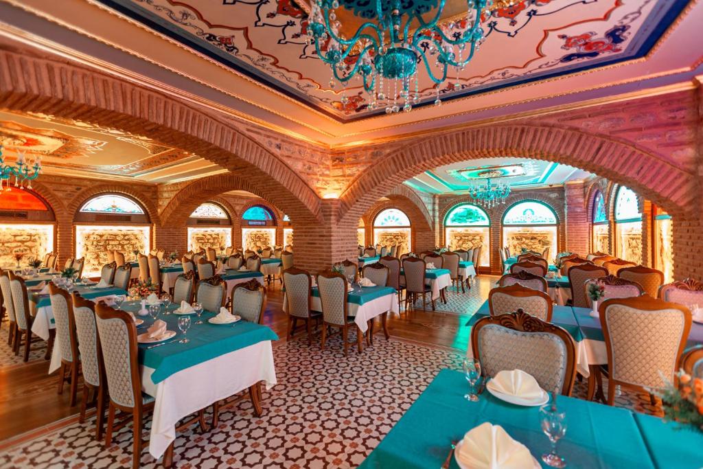 A restaurant or other place to eat at Seven Hills Palace & Spa