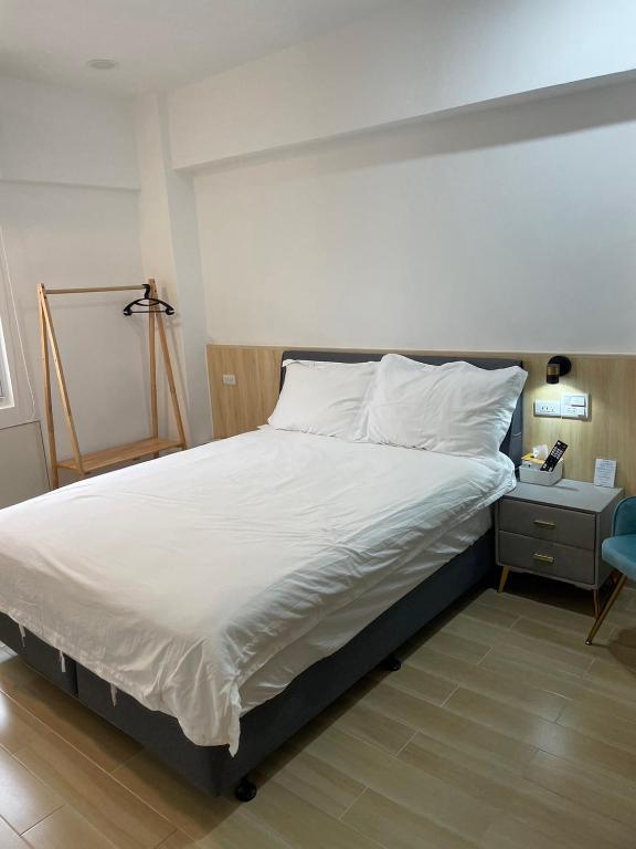 Llit o llits en una habitació de Happiness B&B