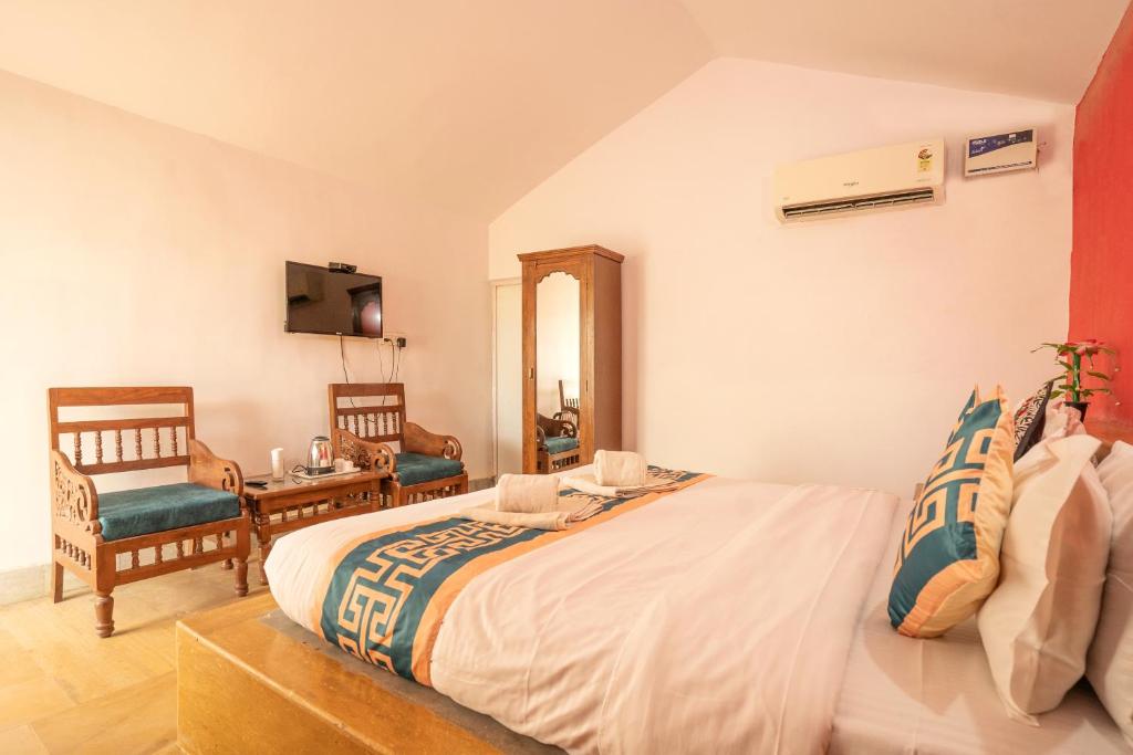 Ein Bett oder Betten in einem Zimmer der Unterkunft Royal Jaisalmer Resort with Swimming Pool