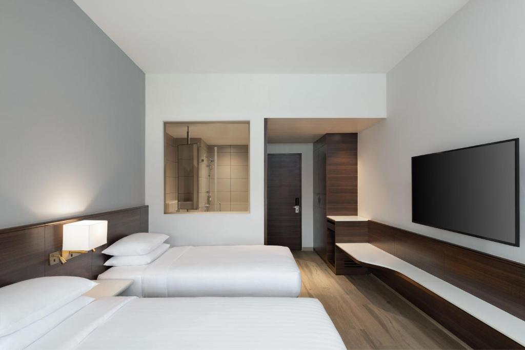 Postel nebo postele na pokoji v ubytování Fairfield by Marriott Goa Benaulim