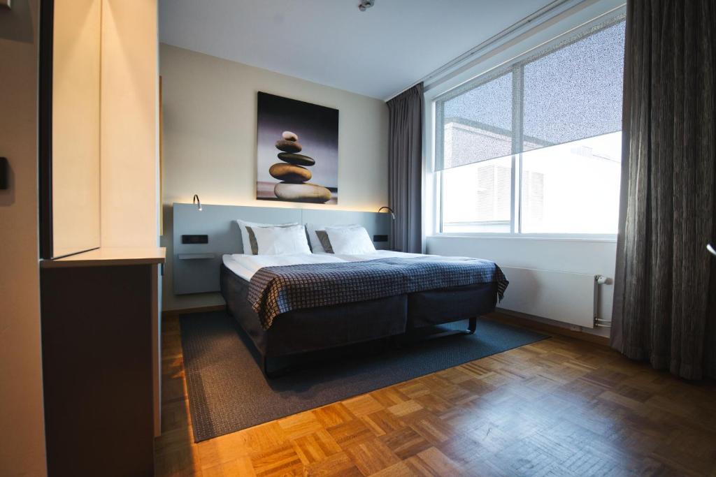 Letto o letti in una camera di Hotel Birger Jarl