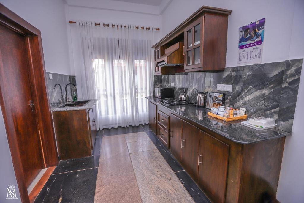 Kuchyň nebo kuchyňský kout v ubytování Rivershore Villas