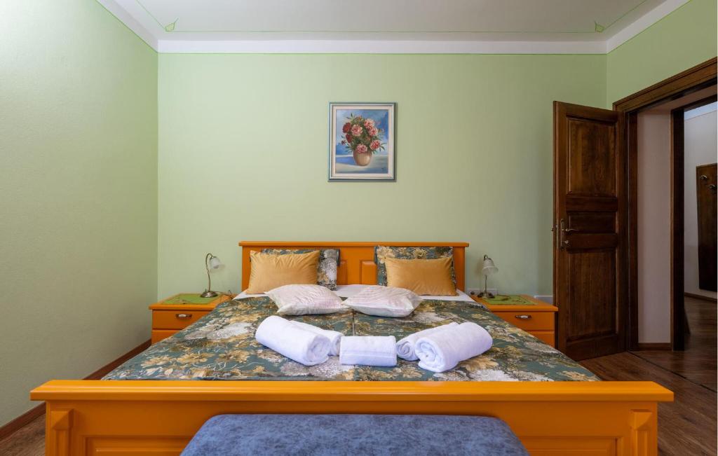 Postel nebo postele na pokoji v ubytování Villa Milena