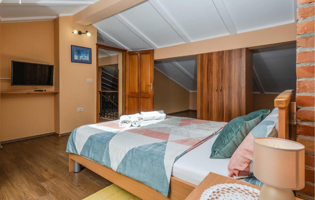 Postel nebo postele na pokoji v ubytování Villa Milena